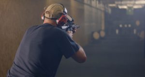 man-in-range-with-rifle-from-behind