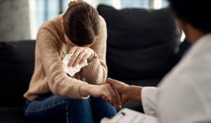 depressed-woman-seeking-solace-from-her-psychotherapist-1-1
